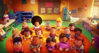 Movie still from “Captain Underpants: The First Epic Movie” (2017), directed by David Soren – A group of children sitting on the floor of a classroom; Extreme Wide shot, High angle