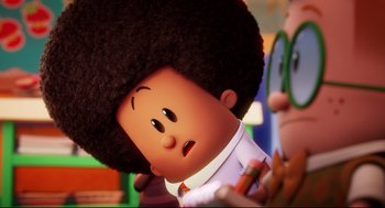 Movie still from “Captain Underpants: The First Epic Movie” (2017), directed by David Soren – A cartoon character with a big afro; Close Up shot, Over the shoulder angle