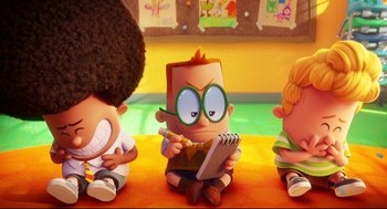 Movie still from “Captain Underpants: The First Epic Movie” (2017), directed by David Soren – A group of kids sitting next to each other on the floor; Medium shot, High angle