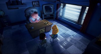 Movie still from “Captain Underpants: The First Epic Movie” (2017), directed by David Soren – A scene from a cartoon with two people sitting at a desk; Extreme Wide shot, High angle