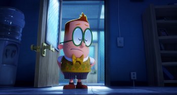 Movie still from “Captain Underpants: The First Epic Movie” (2017), directed by David Soren – A cartoon character with glasses is standing in a room; Wide shot, Over the shoulder angle
