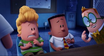 Movie still from “Captain Underpants: The First Epic Movie” (2017), directed by David Soren – A couple of people that are sitting in a room; Medium shot, Over the shoulder angle