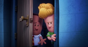 Movie still from “Captain Underpants: The First Epic Movie” (2017), directed by David Soren – A couple of people standing next to each other in front of a door; Medium shot, Over the shoulder angle