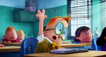 Movie still from “Captain Underpants: The First Epic Movie” (2017), directed by David Soren – A cartoon of a person with a book in his hand; Medium shot, High angle