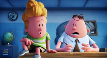 Movie still from “Captain Underpants: The First Epic Movie” (2017), directed by David Soren – A couple of people sitting at a table; Medium shot, Over the shoulder angle