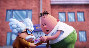 Movie still from “Captain Underpants: The First Epic Movie” (2017), directed by David Soren – A couple of people that are standing up together; Medium shot, Over the shoulder angle