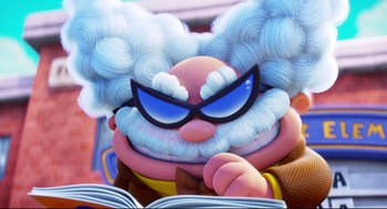 Movie still from “Captain Underpants: The First Epic Movie” (2017), directed by David Soren – An animated character is reading an open book; Close Up shot, Over the shoulder angle