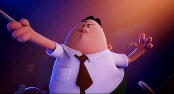 Movie still from “Captain Underpants: The First Epic Movie” (2017), directed by David Soren – A man in white shirt and brown neck tie; Medium shot, Low angle