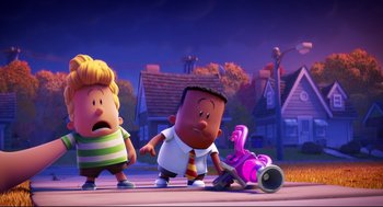 Movie still from “Captain Underpants: The First Epic Movie” (2017), directed by David Soren – A group of people standing next to each other on a street; Extreme Wide shot, Low angle