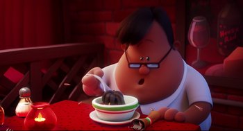Movie still from “Captain Underpants: The First Epic Movie” (2017), directed by David Soren – An animated person is eating a bowl of ice cream; Close Up shot, High angle