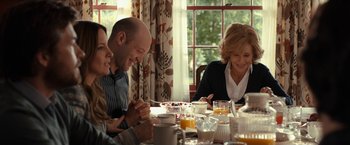Movie still from “This Is Where I Leave You” (2014), directed by Shawn Levy – A group of people sitting at a table eating breakfast; Medium shot, Over the shoulder angle