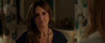 Movie still from “This Is Where I Leave You” (2014), directed by Shawn Levy – A person wearing a blue shirt; Close Up shot, Over the shoulder angle