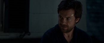 Movie still from “This Is Where I Leave You” (2014), directed by Shawn Levy – A person wearing a black shirt; Close Up shot, Over the shoulder angle