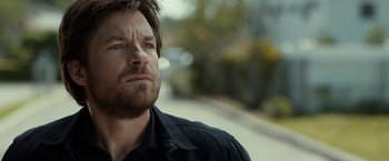 Movie still from “This Is Where I Leave You” (2014), directed by Shawn Levy – A person wearing a black shirt; Close Up shot, Over the shoulder angle