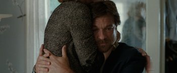Movie still from “This Is Where I Leave You” (2014), directed by Shawn Levy – A person hugging another person; Close Up shot, Over the shoulder angle