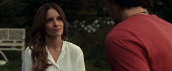 Movie still from “This Is Where I Leave You” (2014), directed by Shawn Levy – A woman standing next to a man in a red shirt; Close Up shot, Over the shoulder angle