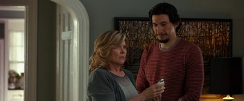 Movie still from “This Is Where I Leave You” (2014), directed by Shawn Levy – A man and a woman looking at a cell phone; Medium shot, Over the shoulder angle