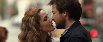 Movie still from “This Is Where I Leave You” (2014), directed by Shawn Levy – A man and a woman are kissing each other; Close Up shot, Over the shoulder angle