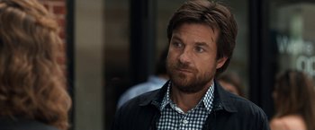 Movie still from “This Is Where I Leave You” (2014), directed by Shawn Levy – A person wearing a jacket; Close Up shot, Over the shoulder angle