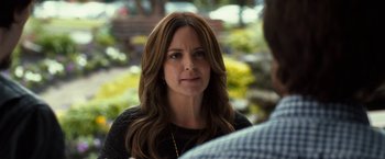 Movie still from “This Is Where I Leave You” (2014), directed by Shawn Levy – A person with long brown hair; Close Up shot, Over the shoulder angle