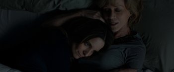 Movie still from “This Is Where I Leave You” (2014), directed by Shawn Levy – A woman laying in bed next to another woman; Close Up shot, Overhead angle