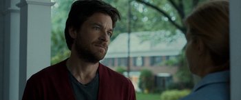 Movie still from “This Is Where I Leave You” (2014), directed by Shawn Levy – A person wearing a red sweater; Close Up shot, Over the shoulder angle