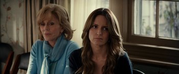 Movie still from “This Is Where I Leave You” (2014), directed by Shawn Levy – Two women sitting next to each other in front of a window; Close Up shot, Over the shoulder angle