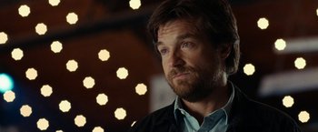 Movie still from “This Is Where I Leave You” (2014), directed by Shawn Levy – A person wearing a jacket; Close Up shot, Over the shoulder angle