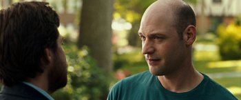 Movie still from “This Is Where I Leave You” (2014), directed by Shawn Levy – A man with a bald head looking to his left; Close Up shot, Over the shoulder angle