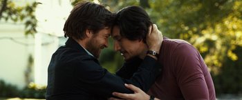 Movie still from “This Is Where I Leave You” (2014), directed by Shawn Levy – A couple of men standing next to one another; Close Up shot, Over the shoulder angle