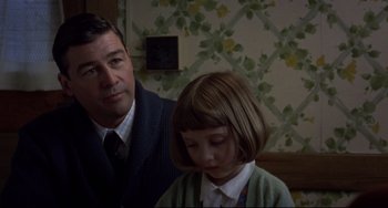 Movie still from “Carol” (2015), directed by Todd Haynes – A man and a little girl looking at each other; Medium shot, Over the shoulder angle