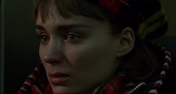 Movie still from “Carol” (2015), directed by Todd Haynes – A person wearing a scarf; Close Up shot, Low angle