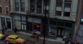 Movie still from “Carol” (2015), directed by Todd Haynes – A man and a woman walking down a street; Extreme Wide shot, High angle