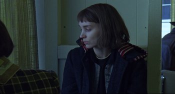 Movie still from “Carol” (2015), directed by Todd Haynes – A woman is talking on a cell phone; Close Up shot, Over the shoulder angle