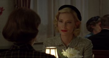 Movie still from “Carol” (2015), directed by Todd Haynes – Cate blanchett in a scene from the movie the house with a clock in its walls; Close Up shot, Over the shoulder angle