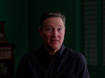 Movie still from “Casting JonBenet” (2017), directed by Kitty Green – A person wearing a black shirt; Close Up shot, High angle