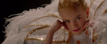Movie still from “Casting JonBenet” (2017), directed by Kitty Green – A person wearing a dress; Close Up shot, High angle