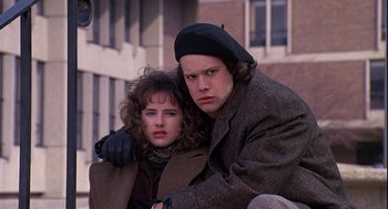 A man and a woman sitting next to each other