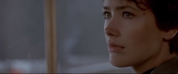 Movie still from “Cliffhanger” (1993), directed by Renny Harlin – A woman's face in front of a mirror; Close Up shot, Over the shoulder angle