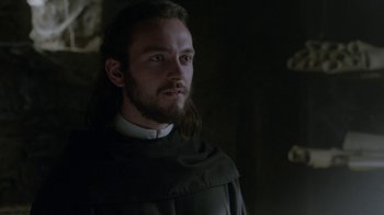 Movie still from “Vikings” (2013), created by Michael Hirst – A person with a beard wearing a robe; Close Up shot, Low angle