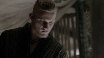 Movie still from “Vikings” (2013), created by Michael Hirst – A person wearing a sweater; Close Up shot, Over the shoulder angle