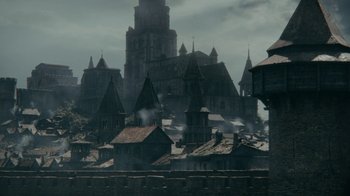 Movie still from “Vikings” (2013), created by Michael Hirst – An image of an old town with a castle in the background; Extreme Wide shot, High angle