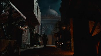 Movie still from “Vikings” (2013), created by Michael Hirst – A man walking down a dark street at night; Extreme Wide shot, Low angle