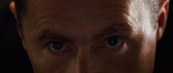 Movie still from “Wanted” (2008), directed by Timur Bekmambetov – A man's eyes with blue eyes; Extreme Close Up shot, Overhead angle