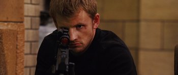 Movie still from “Wanted” (2008), directed by Timur Bekmambetov – A person with a gun; Close Up shot, Over the shoulder angle