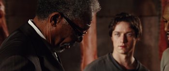 Movie still from “Wanted” (2008), directed by Timur Bekmambetov – A man and a boy looking at each other; Close Up shot, Over the shoulder angle
