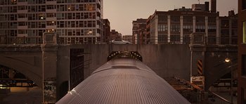 Movie still from “Wanted” (2008), directed by Timur Bekmambetov – A view of a train going down the tracks; Extreme Wide shot, High angle
