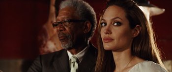 Movie still from “Wanted” (2008), directed by Timur Bekmambetov – A man and a woman sitting next to each other; Close Up shot, Over the shoulder angle