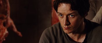 Movie still from “Wanted” (2008), directed by Timur Bekmambetov – A person with blue eyes; Close Up shot, Over the shoulder angle
