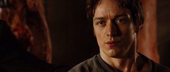 Movie still from “Wanted” (2008), directed by Timur Bekmambetov – A person wearing a shirt; Close Up shot, Over the shoulder angle